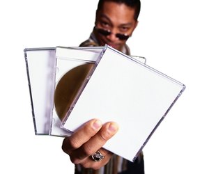Man with CD and cases