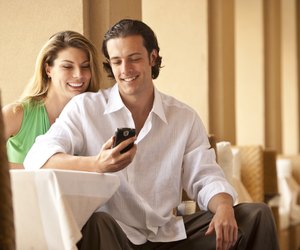 couple looking at smartphone