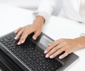 businesswoman using her laptop computer