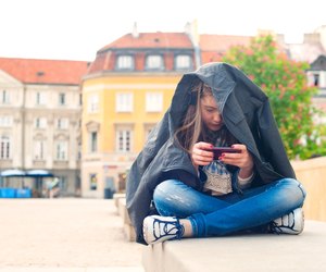 Teenage problems. Young girl addicted to social media technologies.