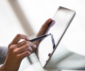 Close-up using tablet pc with digitized pen