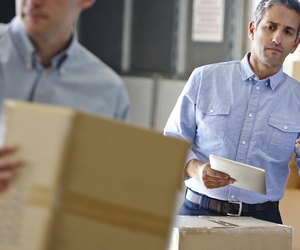 Manager Using Headset In Distribution Warehouse