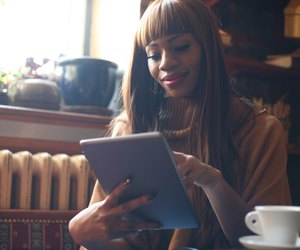 Beautiful African woman on her workplace.