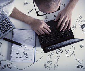 Multitasking businessman at work