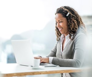 African American businesswoman using computer.