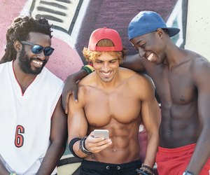 Multiethnic Friends Using Mobile.