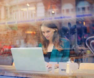 young woman working on laptop