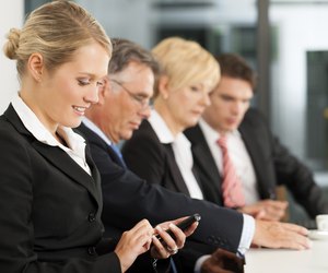 Business - team in office checking mails