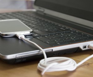 Laptop charging a smartphone