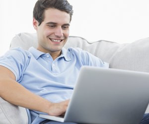 Attractive man using his laptop