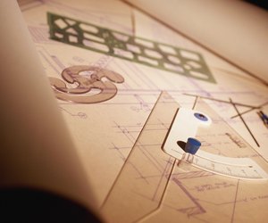 Architectural tools resting on blueprint