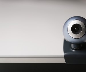 Clip-on webcam mounted on laptop computer