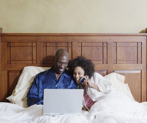 Couple looking at laptop