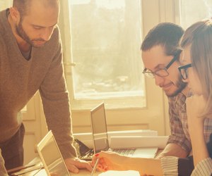 Young group of people/architects discussing business plans