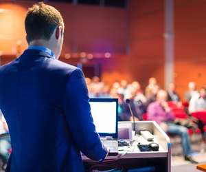 Speaker at Business Conference and Presentation.