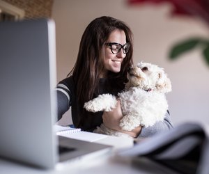 Look at me little one. Woman and her dog