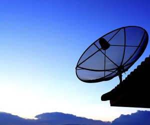 Satellite TV with sunset sky