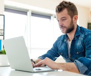 Young man working on laptop