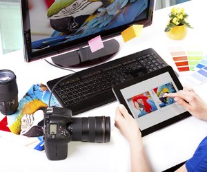 Photo editor working on computer.