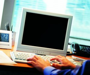 Person typing on a computer