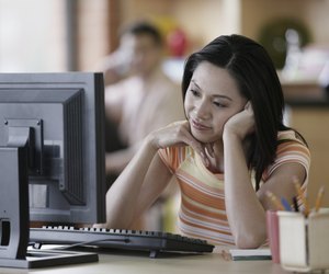 Asian businesswoman at desk