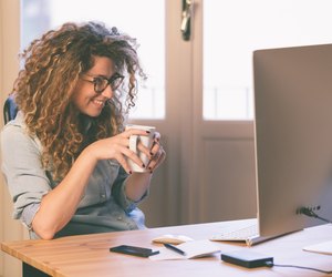 Young woman working at home or in a small office