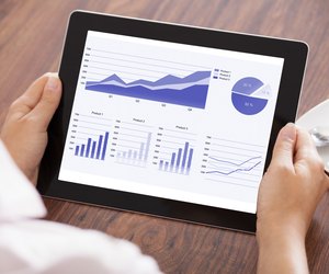 Woman Looking At Digital Tablet