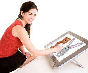 Woman Drawing on Digital Tablet