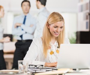 Business woman using laptop