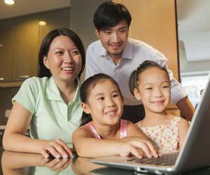 Family watching movie on the laptop