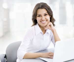 Business woman working on laptop