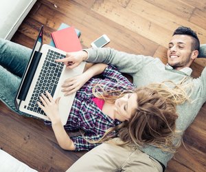 Couple looking at computer laptop