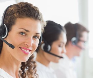 Beautiful businesswoman wearing headset