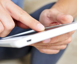 young man using a tablet computer