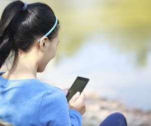 college student use smart phone in campus