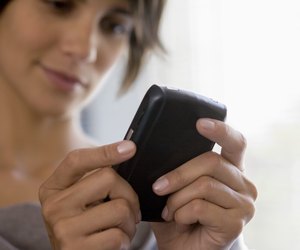 Woman holding personal organizer