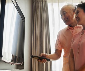Senior couple watching TV