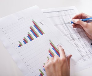 Woman working with bar graphs