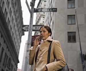 Woman Using Cell Phone in City