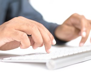 Typing hands on keyboard