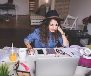 Designer working on her new project from home office