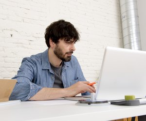 corporate portrait young hispanic hipster businessman working home office