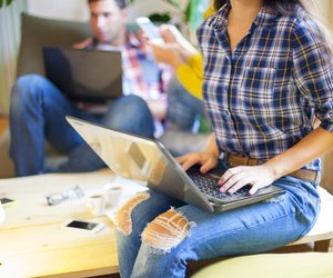 Business people conversation with technology at hand. Exchange o