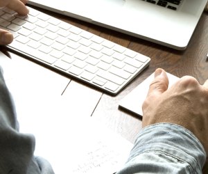 Male hands on keyboard and track pad