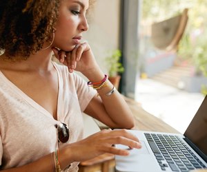 Young african woman working in coffee shop