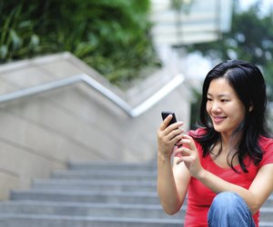 young asian use smartphone