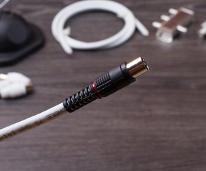 The person fixes antenna connections