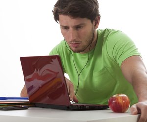 Student watching movie during classes