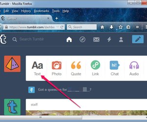 Clicking the Text button on the Tumblr dashboard.