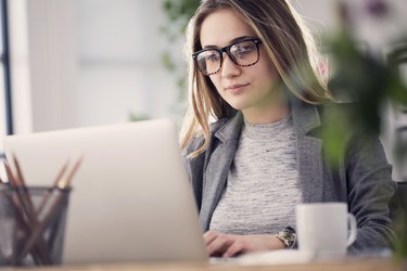 Working woman in computer